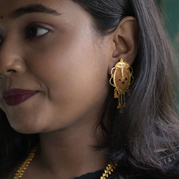 Elegant gold plated Bengali earrings with intricate Minakari work, perfect for bridal wear.