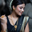 Bengali woman wearing Floral Pasha Slick Sitahar Set, gold plated jewelry with traditional attire and elegant styling.