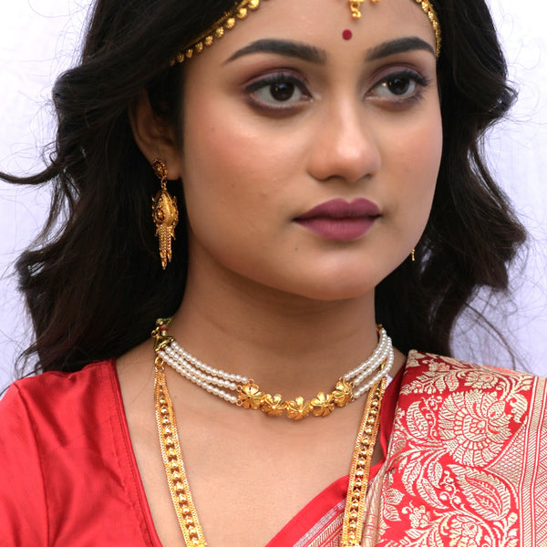 Model wearing Shefali Beaded Choker Set with gold-plated earrings, showcasing Indian traditional jewelry.