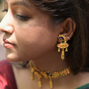 Elegant gold plated choker set featuring intricate earrings, highlighting traditional design elements.