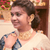 Model wearing a gold plated choker necklace set with matching earrings, showcasing intricate design and elegance.