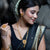 Bengali woman wearing Floral Pasha Slick Sitahar Set, gold plated jewelry with traditional attire and elegant styling.